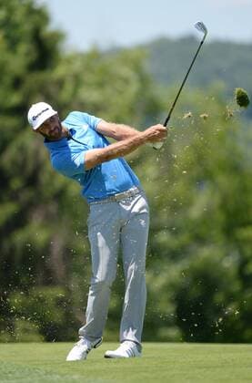 Dustin Johnson hits second shot on the 17th hole of his first round during the Friday round of the U.S. Open golf championship at Oakmont Country Club near Pittsburgh, Pennsylvania on June 17, 2016. Johnson finished at three under par, one back after the first round, which was delayed because of rain yesterday. Johnson will play his second round later in the day.  OAK20160617129 PATxBENIC