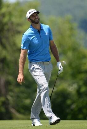 Dustin Johnson looks after he hits his second shot on the 17th hole of his first round during the Friday round of the U.S. Open golf championship at Oakmont Country Club near Pittsburgh, Pennsylvania on June 17, 2016. Johnson finished at three under par, one back after the first round, which was delayed because of rain yesterday. Johnson will play his second round later in the day.  OAK20160617130 PATxBENIC