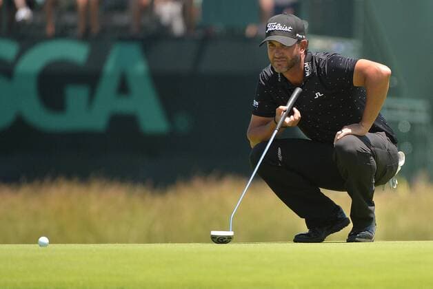 Scott Piercy lines up a putt on the 17th green during the U.S. Open at Oakmont Country Club in Oakmont, Pennsylvania on June 17, 2016.  OAK20160617327 KEVINxDIETSCH