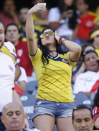 A girl takes a selfie inside a sold out stadium before Peru plays Colombia at the Copa America Centenario USA 2016 quarter-finals at MetLife Stadium in East Rutherford, New Jersey on June 17, 2016.  NYP20160617135 JOHNxANGELILLO