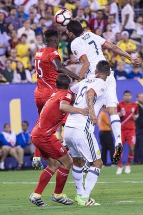 June 17, 2016 - East Rutherford, New Jersey, U.S - Colombia forward CARLOS BACCA (7) heads the ball over Peru defender CHRISTIAN RAMOS (15) during the Copa America Centenario USA 2016 soccer tournament at MetLife Stadium in East Rutherford, NJ Soccer 2016 - Copa America Centenario Colombia vs. Peru 0-0 (4-2) - ZUMAs192