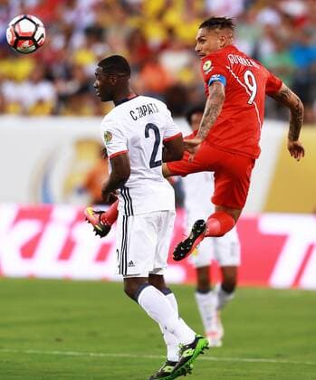 Jose Guerrero (R) of Peru vies with Cristian Zapata of Colombia during their quarterfinal match of 2016 Copa America soccer tournament at the Metlife Stadium in New Jersey, the United States, June 17, 2016. Colombia won in a penalty shootout with 4-2. ) (wll) (SP)US-NEW JERSEY-SOCCER-COPA AMERICA-QUARTERFINAL-PER VS COL QinxLang 