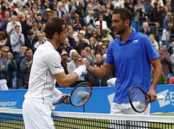 18.06.2016. Queens Club, London, England. Aegon Queens Tennis Championships Day Six. Marin Cilic (CRO) congratulates reigning champion Andy Murray (GBR) at the end of their semi final. Murray won in three sets 6-3, 4-6, 6-3, to go through to the final. xAlanxMartinx  ActionPlus11751175
