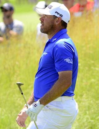 Lee Westwood watches his clip shot from the ruff roll slowly farther and farther away from the hole on the 11th green at the U.S. Open golf championship at Oakmont Country Club near Pittsburgh, on June 17, 2016. Lee Westwood goes on to thre punt for a boogie on the hole.  OAK20160618303 ARCHIExCARPENTER