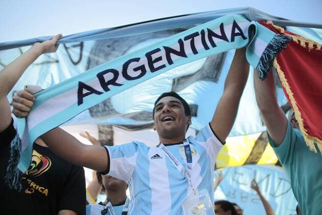 An Argentina fan waves a scarf in the stands prior to the 2016 Copa America Centenario quarterfinal match between Argentina and Venezuela at Gillette Stadium in Foxborough, Massachusetts on June 18, 2016.  BOS2016061804 MATTHEWxHEALEY