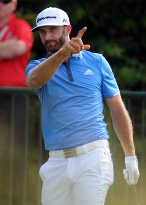Dustin Johnson points to the left after hitting his tee shot on the second hole during the third round at the U.S. Open golf championship at Oakmont Country Club near Pittsburgh, on June 18, 2016.  OAK20160618319 ARCHIExCARPENTER