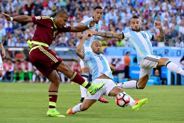 Saturday, June 18, 2016: Argentina midfielder Javier Mascherano (14) blocks a shot by Venezuela forward Salomon Rondon (9) during the Copa America Centenario quarterfinal soccer match between Argentina and Venezuela held at Gillette Stadium in Foxborough, Massachusetts. Argentina defeats Venezuela 4-1. SOCCER 2016: Copa America Centenario Argentina vs Venezuela JUN 18 - ZUMAc04_