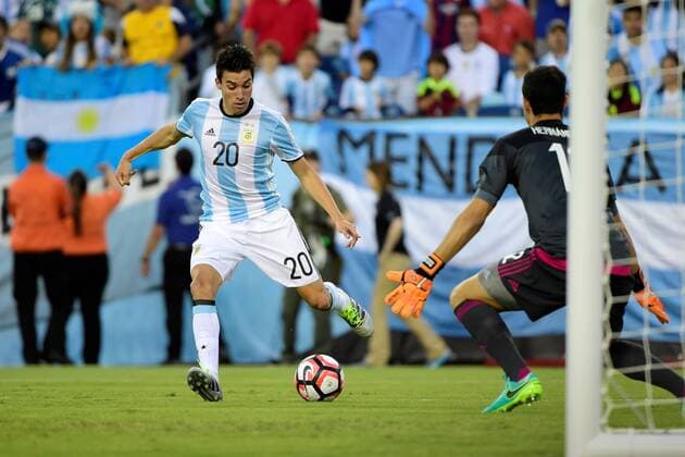 Saturday, June 18, 2016: Argentina forward Nicolas Gaitan (20) attacks Venezuela goalkeeper Dani Hernandez (12) during the Copa America Centenario quarterfinal soccer match between Argentina and Venezuela held at Gillette Stadium in Foxborough, Massachusetts. Argentina defeats Venezuela 4-1. SOCCER 2016: Copa America Centenario Argentina vs Venezuela JUN 18 - ZUMAc04_