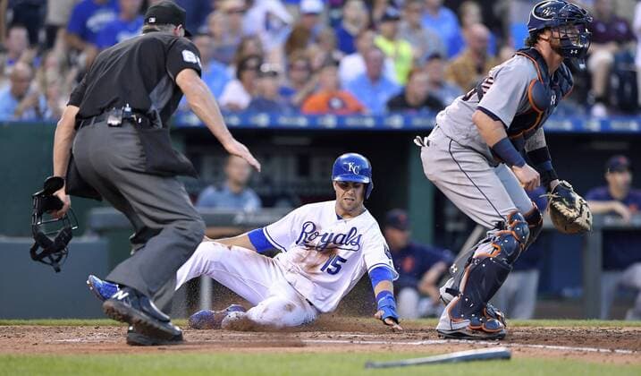 June 18, 2016 - Kansas City, MO, USA - The Kansas City Royals Whit Merrifield scores behind Detroit Tigers catcher Jarrod Saltalamacchia on a single by Alcides Escobar in the fourth inning at Kauffman Stadium in Kansas City, Mo., on Saturday, June 18, 2016. Detroit at Kansas City - ZUMAm67_