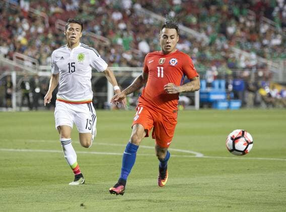 Copa America, Viertelfinale, Mexiko - Chile 0:7 June 18, 2016 - Santa Clara, California, U.S - Eduardo Vargas 11 of Chile with the ball as Hector Moreno of Mexico pursues during their quarterfinal match in the Copa America Centenario 2016 football tournament held at Levis Stadium in Santa Clara, California on Saturday June 18, 2016. Chile defeats Mexico 7-0. Mexico vs. Chile - ZUMAp124