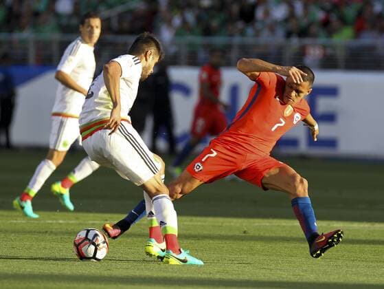 June 18, 2016 - Los Angeles, California, U.S - Chile forward Alexis Sanchez Alexis Sanchez 7 and Mexico defender Nestor Araujo 2 battle for the ball in the Copa America soccer match between Mexico and Chile at the LeviÃ s Stadium in Santa Clara, California, June 18, 2016. Chile won 7-0. Copa America 2016 Quarterfinal Chile defeats Mexico 7-0 - ZUMAc68_