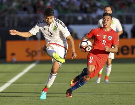 June 18, 2016 - Los Angeles, California, U.S - Mexico defender Nestor Araujo 2 and Chile forward Eduardo Vargas 11 battle foe a ball in the Copa America soccer match between Mexico and Chile at the LeviÃ s Stadium in Santa Clara, California, June 18, 2016. Chile won 7-0. Copa America 2016 Quarterfinal Chile defeats Mexico 7-0 - ZUMAc68_