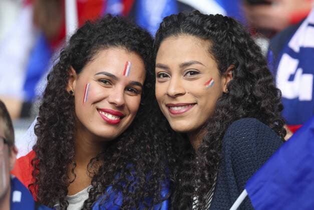 Bilder des Tages - SPORT EURO 2016, Schweiz - Frankreich, Fans Fan, Fans, Fussballfans, supporters, spectators, Zuschauer, Jacke, Kutte, Weste, Fankurve, Schals Fanschals, Maske, Verkleidung, Bemalung im Gesicht, Gesichtsbemalung, Schminke junge huebsche Frau, Maedchen, attraktiv, laecheln, schoen, huebsch, FRANCE - SWITZERLAND Group A ,Football European Championships EURO at June 19, 2016 in Lille, France. Fussball, Nationalteam, Frankreich, Schweiz, EURO