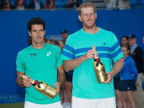 LONDON, Runners-up Chris Guccione (R) of Australia and Andre Sa of Brazil pose for photos during the victory ceremony for the Men s Doubles final with Nicolas Mahut and Pierre-Hugues Herbert of France on day seven of the ATP Tennis Herren 500 Aegon Championships at the Queen s Club in London, Britain on June 19, 2016. ) (SP)BRITAIN-LONDON-TENNIS-AEGON CHAMPIONSHIPS-HERBERT MAHUT VS GUCCIONE SA JonxBuckle 