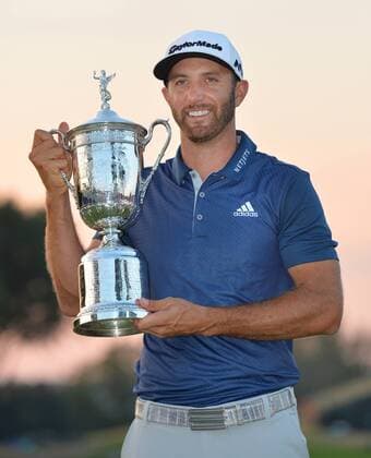 Themen der Woche - Sport Dustin Johnson holds the Championship Trophy on the 18th green after winning his first major championship in the final round at the U.S. Open at Oakmont Country Club near Pittsburgh, Pennsylvania on June 19, 2016. Johnson won with a score of 5 under par.  OAK20160619724 KEVINxDIETSCH