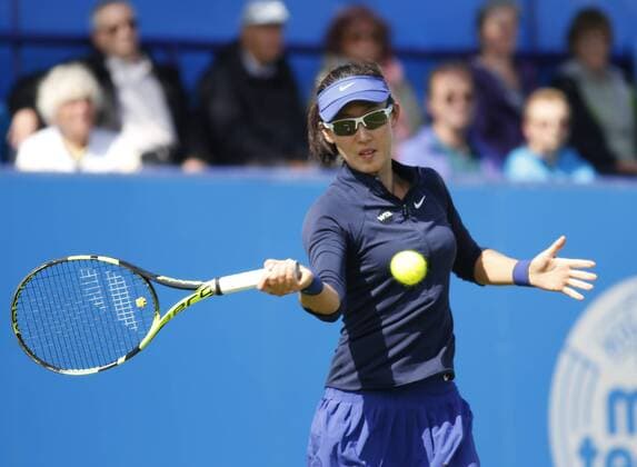 20.06.2016 Eastbourne, England. Aegon WTA Tennis Damen International Eastbourne Tennis Tournament. Action between Andrea Petkovic (GER) and Saisai Zheng (CHN) in their 1st round match at Devonshire Park. xHongboxChenx  ActionPlus11752353