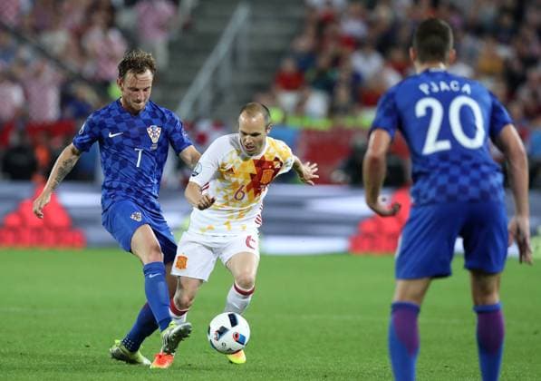 UEFA EURO EM Europameisterschaft Fussball 2016., 3rd round, group D, Croatia - Spain 21.06.2016., Bordeaux, France - UEFA EURO 2016., 3rd round, group D, Croatia - Spain. Ivan Rakitic, Andres Iniesta .  GoranxStanzl PIXSELL