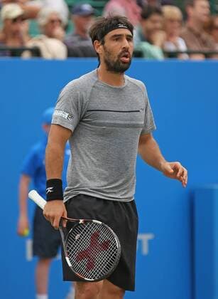 22.06.2016. Nottingham Tennis Centre, Nottingham, England. Aegon Open Mens ATP Tennis Herren Tennis. Marcos Baghdatis of Cyprus queries a line call in his match with Sam Querrey of USA xDavidxKissmanx  ActionPlus11753259