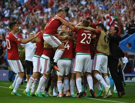 LYON, June 22, 2016 -- Players of Hungary celebrate after scoring during the Euro 2016 Group F soccer match between Portugal and Hungary in Lyon, France, June 22, 2016. ) (SP)FRANCE-LYON-SOCCER-EURO 2016-GROUP F-PORTUGAL VS HUNGARY GuoxYong 