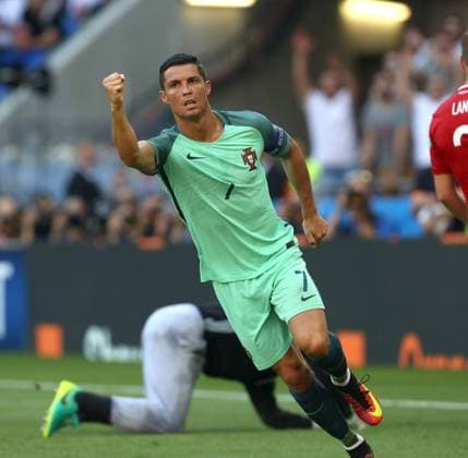 Cristiano Ronaldo of Portugal celebrates scoring his sides second goal during the UEFA European Championship EM Europameisterschaft 2016 match at the Stade de Lyon, Lyon. Picture date June 22nd, 2016 Pic Phil Oldham Sportimage EDITORIAL USE ONLY. No use with unauthorised audio, video, data, fixture lists, club league logos or live services. Online in-match use limited to 120 images, no video emulation. No use in betting, games or single club league player publications.