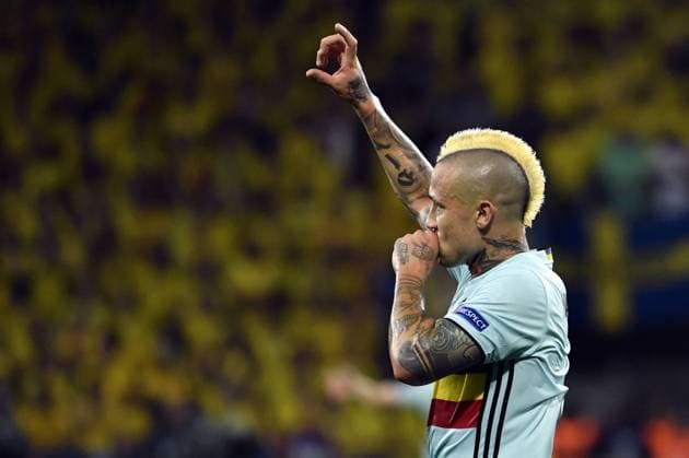 Belgium s Radja Nainggolan celebrates after winning a soccer game between Belgian national soccer team Red Devils and Sweden, in group E of the group stage of the UEFA EURO EM Europameisterschaft Fussball 2016 European Championships, on Wednesday 22 June 2016, in Nice, France. The Euro2016 tournament is taking place from 10 June to 10 July. DIRKxWAEM  x04875805x