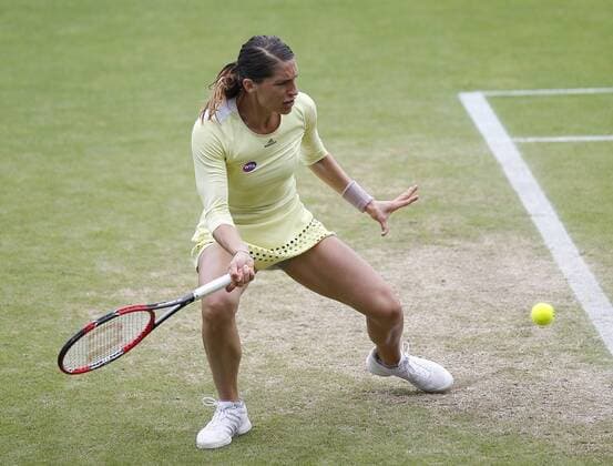 23.06.2016 Eastbourne, England. Aegon International Eastbourne Tennis Tournament. Andrea Petkovic (GER)returns as she is beaten by Ekaterina Makarova (RUS) by a score 3-6, 6-4, 6-0 in their Quarterfinals match at Devonshire Park. xHongboxChenx  ActionPlus11753786
