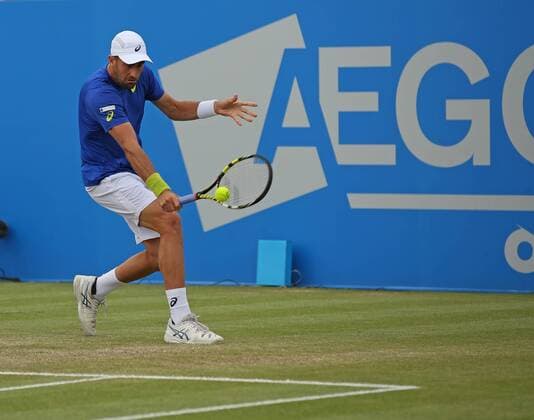24.06.2016. Nottingham Tennis Centre, Nottingham, England. Aegon Open Mens ATP Tennis Herren Tennis. Backhand from Steve Johnson of USA as he heads towards victory over Kevin Anderson of South Africa xDavidxKissmanx  ActionPlus11753889