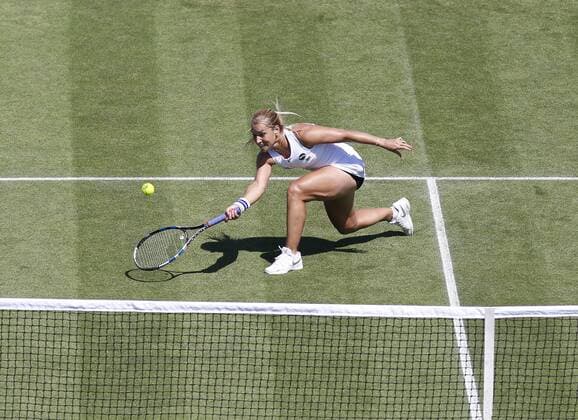 24.06.2016 Eastbourne, England. Aegon International Eastbourne tennis tournament. Dominika Cibulkova (SVK) defeats Agnieszka Radwanska (POL) by a score of 4-6, 7-6(2), 6-3 in their Quarterfinals match at Devonshire Park. xHongboxChenx  ActionPlus11753899