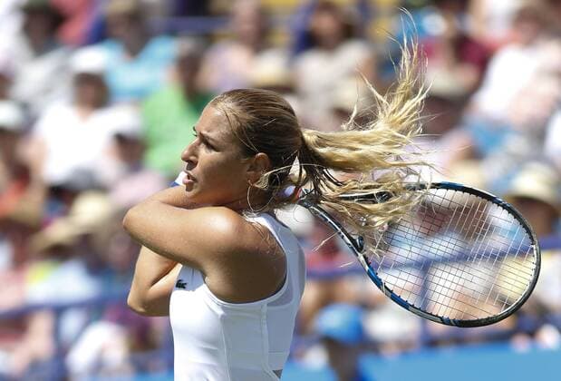 24.06.2016 Eastbourne, England. Aegon International Eastbourne tennis tournament. Dominika Cibulkova (SVK) returns as defeats Agnieszka Radwanska (POL) by a score of 4-6, 7-6(2), 6-3 in their Quarterfinals match at Devonshire Park. xHongboxChenx  ActionPlus11753908