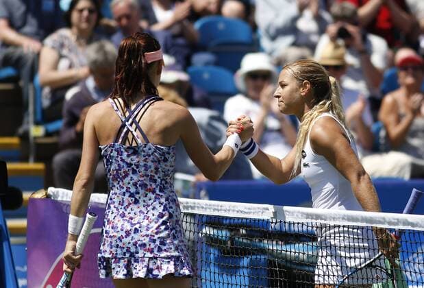 24.06.2016 Eastbourne, England. Aegon International Eastbourne tennis tournament. Dominika Cibulkova (SVK) shakes hands as defeats Agnieszka Radwanska (POL) by a score of 4-6, 7-6(2), 6-3 in their Quarterfinals match at Devonshire Park. xHongboxChenx  ActionPlus11753916