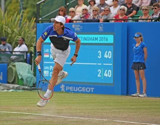24.06.2016. Nottingham Tennis Centre, Nottingham, England. Aegon Open Mens ATP Tennis Herren Tennis. Pablo Cuevas of Uruguay serves in his semi final match against Gilles Muller of Luxembourg xDavidxKissmanx  ActionPlus11753934
