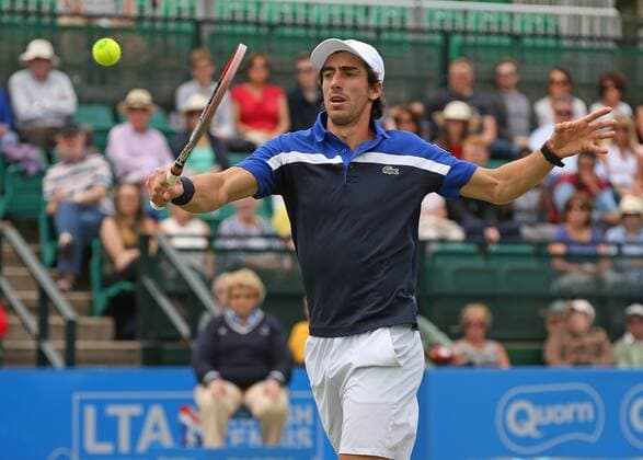24.06.2016. Nottingham Tennis Centre, Nottingham, England. Aegon Open Mens ATP Tennis Herren Tennis. Volley from Pablo Cuevas of Uruguay in his semi final match against Gilles Muller of Luxembourg xDavidxKissmanx  ActionPlus11753935