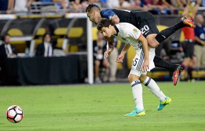 USA s Geoff Cameron (T) rides the back of Columbia s Stefan Medina as the ball gets away in the second half of the USA-Columbia match during the COPA America Centenario at University of Phoenix Stadium in Glendale, Arizona, June 25, 2016. Columbia defeated USA 1-0.  PXP2016062510 ARTxFOXALL