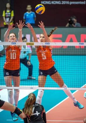 June 26, 2016 - Hong Kong, Hong Kong S.A.R, China - LONNEKE SLOETJES (L)of the Netherlands jumps for the ball with teammate ROBIN DE KRUIJF (R).FIVB Volleyball World Grand Prix Hong Kong 2016. Netherlands secure a place in the semi-finals with a 3-0 win over Germany in Hong Kong with scores of 26-24,25-20,25-22. The Netherlands beat Germany in th FIVB Volleyball World Grand Prix Hong Kong 2016 - ZUMAr144