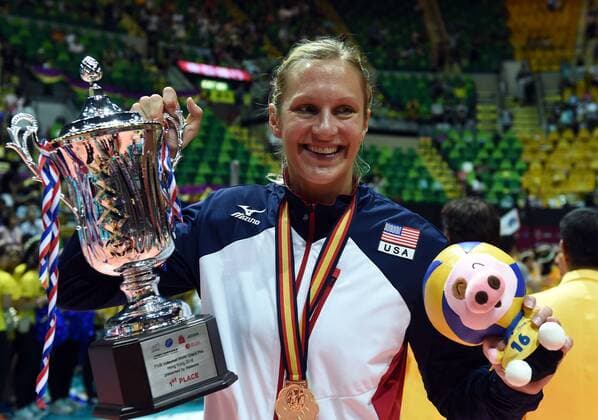 (160626) -- HONG KONG, June 26, 2016 -- United States Christa Harmotto Dietzen celebrates with the trophy after the awarding ceremony of FIVB volleyball World Grand Prix (Hong Kong) 2016 in Hong Kong, south China, June 26, 2016. USA beat China 3-0 in the last-day-match and claimed the title of the event. ) (SP)CHINA-HONG KONG-VOLLEYBALL-FIVB-WORLD GRAND PRIX LoxPingxFai 