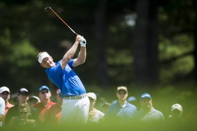 Billy Hurley III plays his tee shot on the par-3 2nd hole at the Quicken Loans National golf tournament at Congressional CC in Bethesda, Maryland on Sunday, June 36, 2016. Hurley, of Annapolis, Maryland, shot a 2-under 69 on Sunday for his first tournament win.  WAP201606260144 PETExMAROVICH