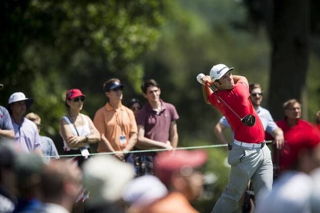 Spaniard Jon Rahm plays his tee shot on the 4th hole at Congressional CC during the final round of the Quicken Loans National golf tournament in Bethesda, Maryland on June 26, 2016. Billy Hurley III, of Annapolis Maryland, shot a 2-under 69 on Sunday for his first tournament win.  WAP201606260183 PETExMAROVICH