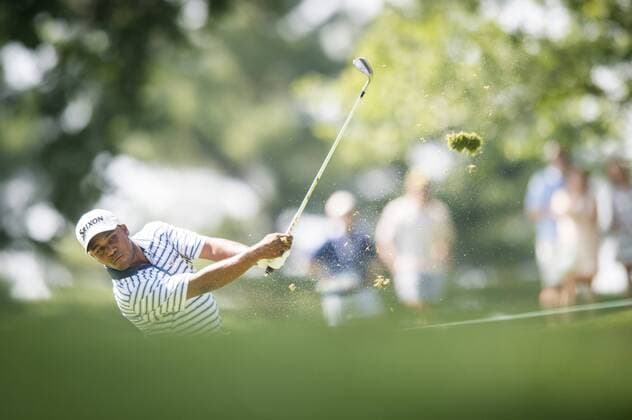 Harold Varner III of Gastonia, North Carolina, plays his approach shot on the 9th hole at Congressional CC during the final round of the Quicken Loans National golf tournament in Bethesda, Maryland on Sunday, June 36, 2016. Billy Hurley III, of Annapolis Maryland, shot a 2-under 69 on Sunday for his first tournament win.  WAP201606260331 PETExMAROVICH
