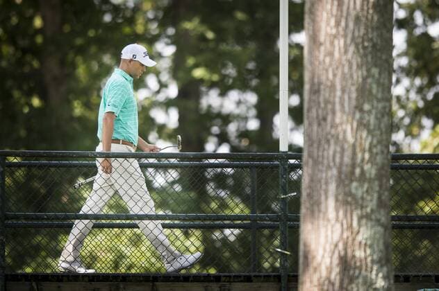 Bill Haas of Greenville, South Carolina, walks across the bridge on the 9th hole at Congressional CC during the final round of the Quicken Loans National golf tournament in Bethesda, Maryland on June 26, 2016. Billy Hurley III, of Annapolis Maryland, shot a 2-under 69 on Sunday for his first tournament win.  WAP201606260350 PETExMAROVICH