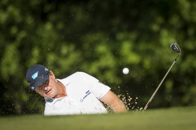 South African golfer Ernie Els plays out of the greenside bunker on the 14th hole at Congressional CC during the final round of the Quicken Loans National golf tournament in Bethesda, Maryland on Sunday, June 36, 2016. Billy Hurley III, of Annapolis Maryland, shot a 2-under 69 on Sunday for his first tournament win.  WAP201606260503 PETExMAROVICH
