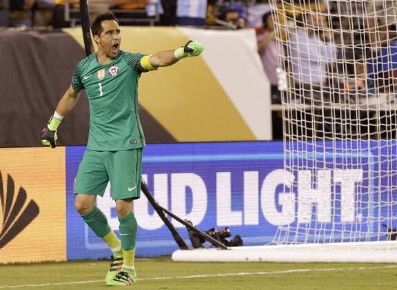 Claudio Bravo of Chile celebrates after making a save during the penalty kicks against Argentina at the Copa America Centenario USA 2016 Finals at MetLife Stadium in East Rutherford, New Jersey on June 26, 2016. Chile defeated Argentina 4-2 in penalty kicks and won there second consecutive Copa America.  NYP20160626117 JOHNxANGELILLO