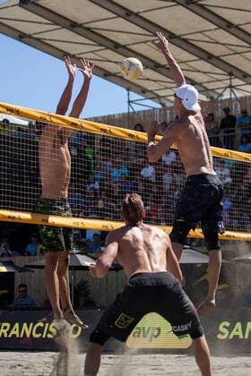 26 June 2016: Jake Gibb (right) gets the ball over the net as Stafford Slick goes up for a block during the AVP San Francisco Open in San Francisco, CA. (Photo by Hailey Archambault Icon Sportswire) VOLLEYBALL: JUN 26 AVP San Francisco Open Icon160626207 EDITORIAL USE ONLY