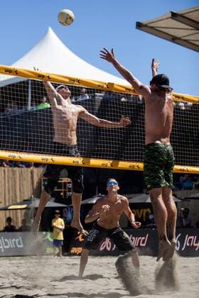 26 June 2016: Jake Gibb (left) looks to get the ball over the net as Stafford Slick goes up for a block and teammate Casey Patterson looks on during the AVP San Francisco Open in San Francisco, CA. (Photo by Hailey Archambault Icon Sportswire) VOLLEYBALL: JUN 26 AVP San Francisco Open Icon160626252 EDITORIAL USE ONLY