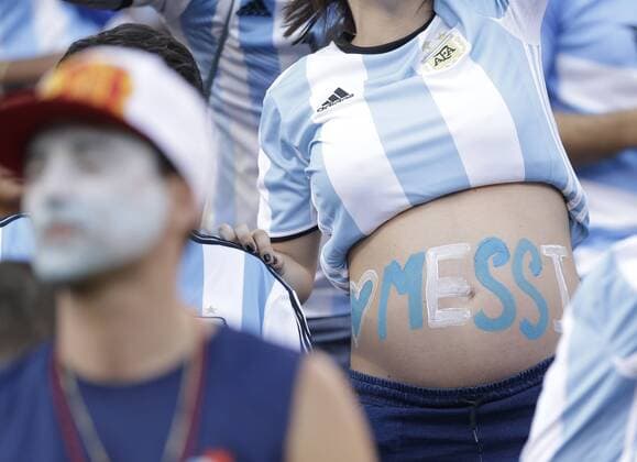 A fan with Messi painted on her belly waits for Argentina to play Chile at the Copa America Centenario USA 2016 Finals at MetLife Stadium in East Rutherford, New Jersey on June 26, 2016. Chile defeated Argentina 4-2 in penalty kicks and won there second consecutive Copa America.  NYP20160626133 JOHNxANGELILLO