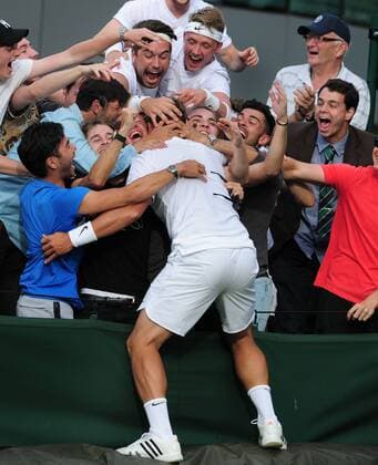 Tennis - 2016 Wimbledon Championships - Week One, Monday (Day One) Mens Singles, Round One Ricardas Berankis (LTU) v Marcus Willis (GBR) Marcus Willis celebrates winning the match with his army of friends on Court 17 COLORSPORT ANDREW COWIE 