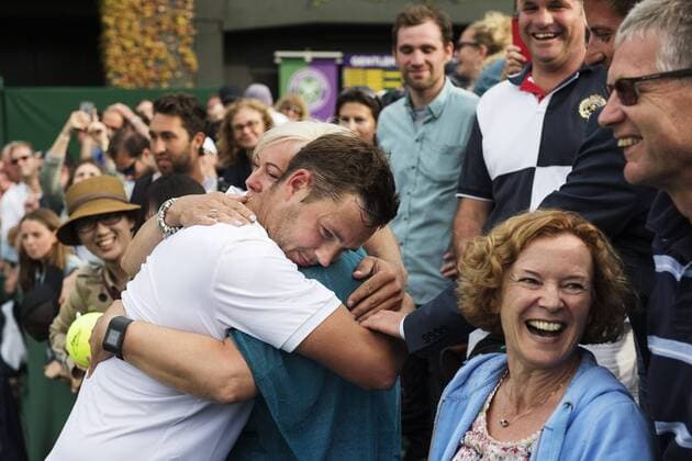 160627, Tennis, Wimbledon, Dag 1: Marcus Willis (GBR) gets a hug from his mother Cathy Willis after he won in GentlemenÕs Singles first round. The Championships 2016 at The All England Lawn Tennis Club, Wimbledon. Day 1 Monday 27 06 2016.  Copyright: JOELxMARKLUND BB160627JM023