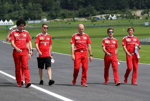 FORMULA 1 - GP of Austria 2016 SPIELBERG,AUSTRIA,30.JUN.16 - MOTORSPORTS, FORMULA 1 - Grand Prix of Austria, Red Bull Ring, preview. Image shows Sebastian Vettel (GER Scuderia Ferrari 3rd from left) with team members. GEPAxpictures xChristianxWalgram