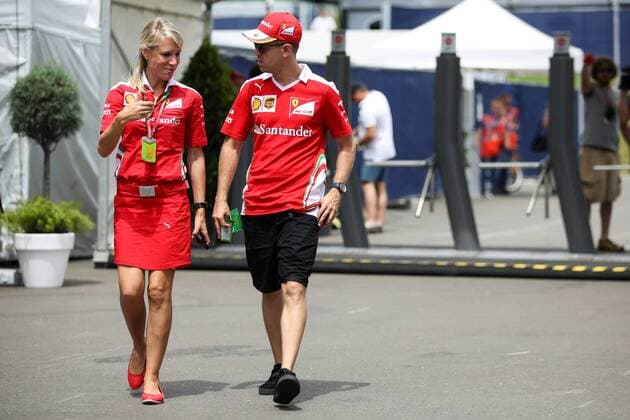 FORMULA 1 - GP of Austria 2016 SPIELBERG,AUSTRIA,30.JUN.16 - MOTORSPORTS, FORMULA 1 - Grand Prix of Austria, Red Bull Ring, preview. Image shows Britta Roeske and Sebastian Vettel (GER Ferrari). GEPAxpictures xDanielxGoetzhaber