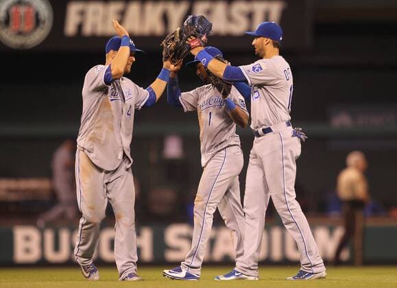 Kansas City Royals (L to R) Alex Gordon, Jarrod Dyson and Paulo Orlando celebrate the third out and a 4-2 win over the St. Louis Cardinals at Busch Stadium in St. Louis on June 30, 2016.  SLP2016063014 BILLxGREENBLATT