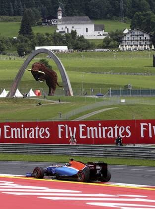 FORMULA 1 - GP of Austria 2016 SPIELBERG,AUSTRIA,01.JUL.16 - MOTORSPORTS, FORMULA 1 - Grand Prix of Austria, Red Bull Ring, free practice. Image shows Rio Haryanto (INA Manor). Keywords: iron Red Bull sculpture. GEPAxpictures xHansxOberlaender